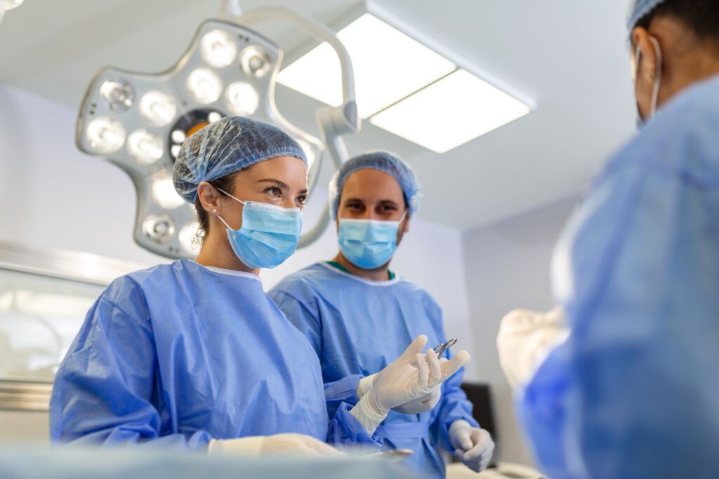 Surgical team working together in an operating room