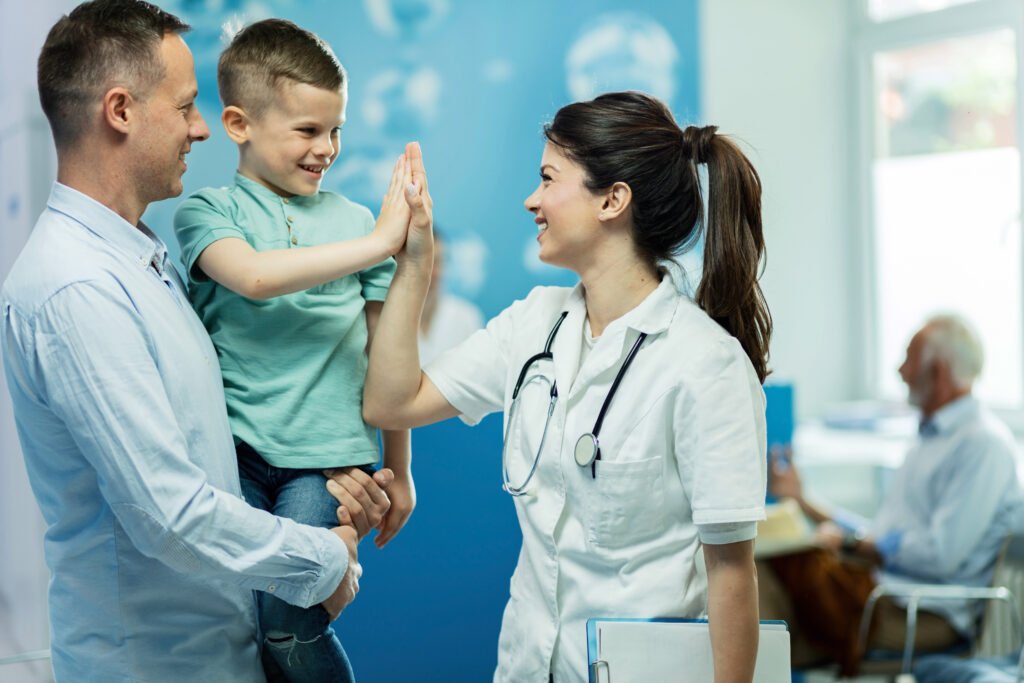 Doctor greeting a child and parent during a same-day clinic visit in Cyprus